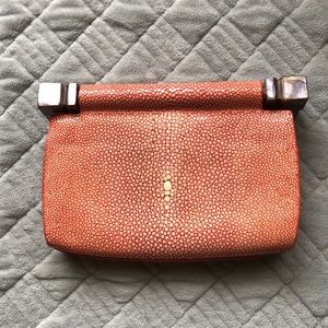 Celestina Stingray leather clutch with mother pearls design